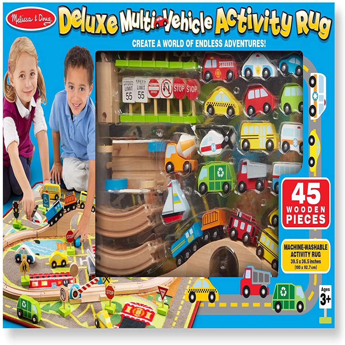 Melissa & Doug Deluxe Multi-Vehicle Activity Rug (39.5" x 36.5") - 19 Vehicles, 12 Wooden Signs, Train Tracks - Wood | Multi | 1